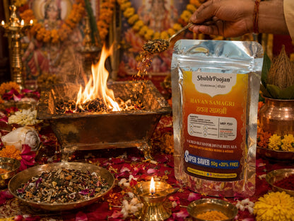 ShubhPoojan Havan Samagri packet on a traditional altar with fire and offerings.